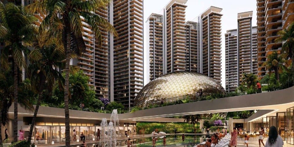 Elan The Presidential Penthouses — towers above a retail plaza with a glass dome